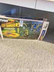 MaxSold Auction: Tyco Zero Gravity Cliff Hanger (Nite-Glow) Slot Car Track Set B - Toronto (Ontario, Canada) Downsizing Online Auction - Bonacres Avenue