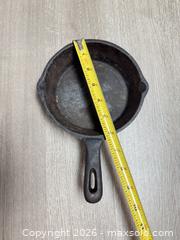 MaxSold Auction: Lot of 4 Cast Iron Skillets  - Cocoa (Florida, USA) SELLER MANAGED Estate Sale Online Auction - Broadcast Court