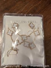MaxSold Auction: Four-Leaf Clover Necklace and Ring Set - Vancouver (British Columbia, Canada) SELLER MANAGED Downsizing Online Auction - Shaughnessy Street