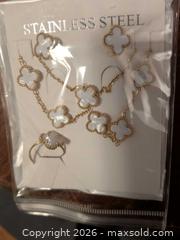 MaxSold Auction: Four-Leaf Clover Necklace and Ring Set - Vancouver (British Columbia, Canada) SELLER MANAGED Downsizing Online Auction - Shaughnessy Street