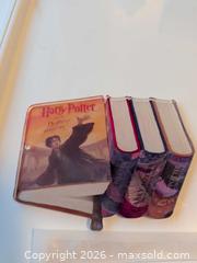 MaxSold Auction: Harry Potter Stack of Books Acrylic Ornament, Multicolor & Gold - Vancouver (British Columbia, Canada) SELLER MANAGED Downsizing Online Auction - Shaughnessy Street