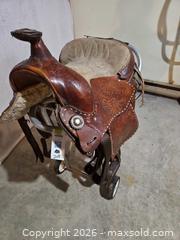 MaxSold Auction: 14" Brown Leather Western Saddle with Floral Tooling - Elizabethtown-Kitley (Ontario, Canada) PARTNER MANAGED Estate Sale Online Auction - Rocksprings Road