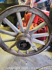 MaxSold Auction: Antique Wooden Wagon Wheel with Iron Rim, 36–48 in - Elizabethtown-Kitley (Ontario, Canada) PARTNER MANAGED Estate Sale Online Auction - Rocksprings Road