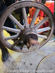 MaxSold Auction: Antique Wooden Wagon Wheel with Iron Rim, 36–48 in - Elizabethtown-Kitley (Ontario, Canada) PARTNER MANAGED Estate Sale Online Auction - Rocksprings Road