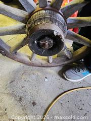 MaxSold Auction: Antique Wooden Wagon Wheel with Iron Rim, 36–48 in - Elizabethtown-Kitley (Ontario, Canada) PARTNER MANAGED Estate Sale Online Auction - Rocksprings Road