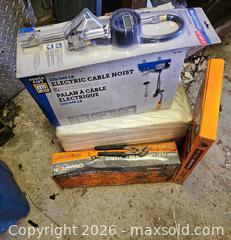MaxSold Auction: Lot: Electric Cable Hoist, Tire Gauge, Target Thrower, Gorilla Tarp - Elizabethtown-Kitley (Ontario, Canada) PARTNER MANAGED Estate Sale Online Auction - Rocksprings Road