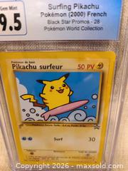 MaxSold Auction: Pikachu Black Star Promo (Surfing Pikachu) French Trading Card - Toronto (Ontario, Canada) SELLER MANAGED Downsizing Online Auction - Rutland Street