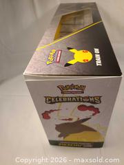 MaxSold Auction: Pokemon Celebrations Pikachu VMAX Figure & Trading Cards - Toronto (Ontario, Canada) SELLER MANAGED Downsizing Online Auction - Rutland Street