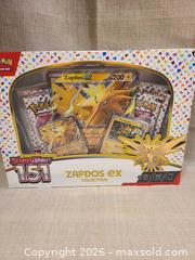 MaxSold Auction: Pokémon Scarlet & Violet 151 Zapdos TCG Box/Collection - Toronto (Ontario, Canada) SELLER MANAGED Downsizing Online Auction - Rutland Street