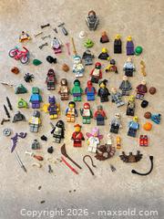 MaxSold Auction: LEGO Mixed Minifigures, Heads, Torsos & Accessories (50 plus pieces) - Ogden (New York, USA) SELLER MANAGED Downsizing Online Auction - Village Hill Drive