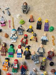 MaxSold Auction: LEGO Mixed Minifigures, Heads, Torsos & Accessories (50 plus pieces) - Ogden (New York, USA) SELLER MANAGED Downsizing Online Auction - Village Hill Drive