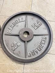 MaxSold Auction: Pair of 45 lb Olympic Cast Iron Weight Plates - East Brunswick (New Jersey, USA) SELLER MANAGED Reseller Online Auction - Tices Lane