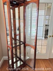 MaxSold Auction: Cherry Wood Curio Cabinet with Glass Doors & Mirrored Back - Kitchener (Ontario, Canada) SELLER MANAGED Downsizing Online Auction - Templeton Drive