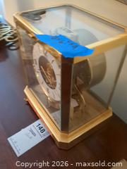 MaxSold Auction: LeCoultre Atmos Perpetual Motion Mantel Clock, Brass & Glass B - East Vincent Township (Pennsylvania, USA) Downsizing Online Auction - Sheeder Road