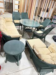 MaxSold Auction: 9-Piece Green Wicker Patio Dining & Seating Set with Glass Table - Commerce City (Colorado, USA) SELLER MANAGED Estate Sale Online Auction - E. 99th Avenue