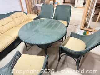 MaxSold Auction: 9-Piece Green Wicker Patio Dining & Seating Set with Glass Table - Commerce City (Colorado, USA) SELLER MANAGED Estate Sale Online Auction - E. 99th Avenue