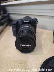 MaxSold Auction: Sony Alpha 100 DSLR with Tamron & Sigma Zoom Lenses, Tripod, Bag - Commerce City (Colorado, USA) SELLER MANAGED Estate Sale Online Auction - E. 99th Avenue