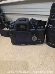 MaxSold Auction: Sony Alpha 100 DSLR with Tamron & Sigma Zoom Lenses, Tripod, Bag - Commerce City (Colorado, USA) SELLER MANAGED Estate Sale Online Auction - E. 99th Avenue
