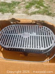 MaxSold Auction: Lodge Cast Iron Sportsman's Grill (approx 17.4 x 9 in) - Polk City (Florida, USA) SELLER MANAGED Downsizing Online Auction - Conley Drive