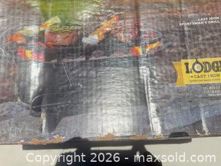 MaxSold Auction: Lodge Cast Iron Sportsman's Grill (approx 17.4 x 9 in) - Polk City (Florida, USA) SELLER MANAGED Downsizing Online Auction - Conley Drive