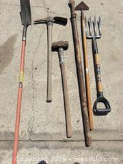 MaxSold Auction: Lot of 7+ Garden Tools: Shovels, Pickaxe, Sledgehammer, Fork, Hoe - Polk City (Florida, USA) SELLER MANAGED Downsizing Online Auction - Conley Drive