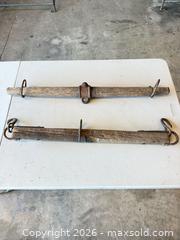 MaxSold Auction: Pair of Wooden Yokes / Harness Beams with Iron Hardware - Polk City (Florida, USA) SELLER MANAGED Downsizing Online Auction - Conley Drive