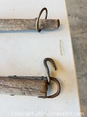 MaxSold Auction: Pair of Wooden Yokes / Harness Beams with Iron Hardware - Polk City (Florida, USA) SELLER MANAGED Downsizing Online Auction - Conley Drive
