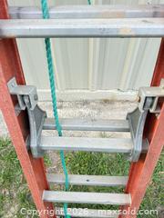 MaxSold Auction: Red Fiberglass Extension Ladder, 20–30 ft, 12–20 Rungs - Polk City (Florida, USA) SELLER MANAGED Downsizing Online Auction - Conley Drive
