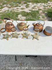 MaxSold Auction: Set: 3 Copper/Brass Kettles, Small Pan, 4 Glass Starfish Votives - Polk City (Florida, USA) SELLER MANAGED Downsizing Online Auction - Conley Drive