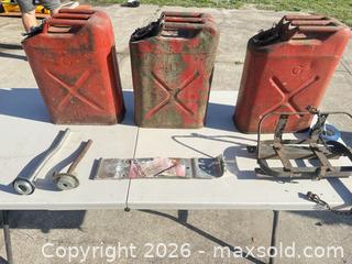 MaxSold Auction: Three Steel Military Jerry Cans, Red & Green, 3-5 Gallon - Polk City (Florida, USA) SELLER MANAGED Downsizing Online Auction - Conley Drive