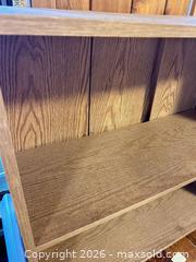 MaxSold Auction: Brown Oak-Tone Engineered Wood Bookcase, 2 Shelves, 3 Compartments - Water Valley (Alberta, Canada) PARTNER MANAGED Moving Online Auction - Range Road 52