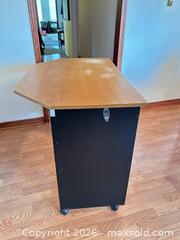 MaxSold Auction: Small Brown Wood Tone Computer Desk with Storage Shelf - Water Valley (Alberta, Canada) PARTNER MANAGED Moving Online Auction - Range Road 52