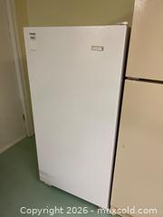 MaxSold Auction: Kelvinator Upright Freezer, Model MFU09M2BW4, 24×26.5×52 Inches - Kingston (Ontario, Canada) PARTNER MANAGED Downsizing Online Auction - Sunnyside Road