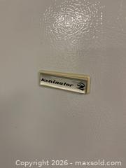 MaxSold Auction: Kelvinator Upright Freezer, Model MFU09M2BW4, 24×26.5×52 Inches - Kingston (Ontario, Canada) PARTNER MANAGED Downsizing Online Auction - Sunnyside Road