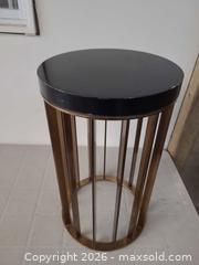 MaxSold Auction: Baker End Table with Brass Base and Black Wood Top Made in Italy - Toronto (Ontario, Canada) PARTNER MANAGED Reseller Online Auction - Queen Street West