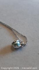 MaxSold Auction: Green Pearl-drop Necklace - North Vancouver (British Columbia, Canada) SELLER MANAGED Estate Sale Online Auction - 28th Street West (CONDO)