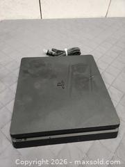 MaxSold Auction: Play Station 4 Console and Power Cord Model CUH-2215B, Powers on, Untested - Pelham (Ontario, Canada) SELLER MANAGED Reseller Online Auction - Foss Road