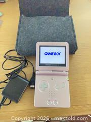 MaxSold Auction: Gameboy GBA SP Pink -AGS-101 - Oshawa (Ontario, Canada) SELLER MANAGED Downsizing Online Auction - Deer Valley Drive