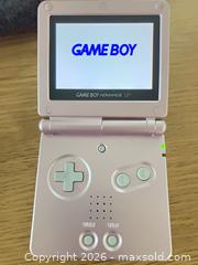 MaxSold Auction: Gameboy GBA SP Pink -AGS-101 - Oshawa (Ontario, Canada) SELLER MANAGED Downsizing Online Auction - Deer Valley Drive