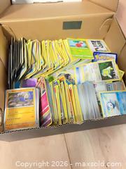 MaxSold Auction: Shoebox of Pokemon Cards - Oshawa (Ontario, Canada) SELLER MANAGED Downsizing Online Auction - Deer Valley Drive