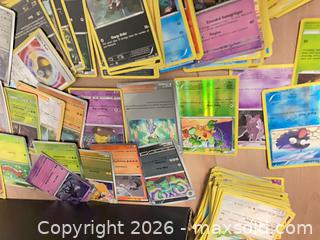 MaxSold Auction: Shoebox of Pokemon Cards - Oshawa (Ontario, Canada) SELLER MANAGED Downsizing Online Auction - Deer Valley Drive