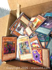MaxSold Auction: Thousands of unsorted Yugioh cards.  - Oshawa (Ontario, Canada) SELLER MANAGED Downsizing Online Auction - Deer Valley Drive