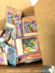 MaxSold Auction: Thousands of unsorted Yugioh cards.  - Oshawa (Ontario, Canada) SELLER MANAGED Downsizing Online Auction - Deer Valley Drive
