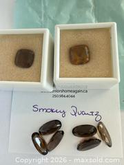 MaxSold Auction: Mixed Loose Gemstones: Tanzanite, Peridot, Ruby, Smoky Quartz - Langford (British Columbia, Canada) PARTNER MANAGED Estate Sale Online Auction - Leigh Road