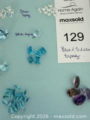 MaxSold Auction: Mixed Lot Loose Cut Gemstones: Blue Topaz, White Topaz, Amethyst - Langford (British Columbia, Canada) PARTNER MANAGED Estate Sale Online Auction - Leigh Road