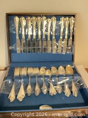 MaxSold Auction: 45-Piece Silver-Plated Ornate Flatware Set with Wooden Chest - Henderson (Nevada, USA) PARTNER MANAGED Estate Sale Online Auction - West Warm Springs Road