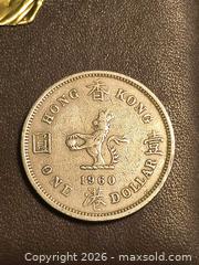 MaxSold Auction: 1960 Hong Kong one Dollar Coin  - South Frontenac (Ontario, Canada) SELLER MANAGED Moving Online Auction - Battersea Road