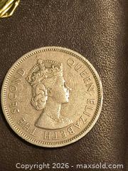 MaxSold Auction: 1960 Hong Kong one Dollar Coin  - South Frontenac (Ontario, Canada) SELLER MANAGED Moving Online Auction - Battersea Road