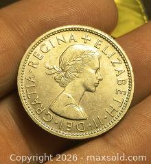 MaxSold Auction: 1963 2 Shillings one Florin coin Mint UNC - South Frontenac (Ontario, Canada) SELLER MANAGED Moving Online Auction - Battersea Road