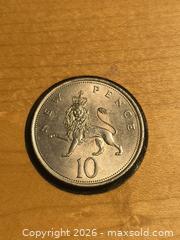 MaxSold Auction: Uncircilated 10 New Pence Lion Coin England  - South Frontenac (Ontario, Canada) SELLER MANAGED Moving Online Auction - Battersea Road